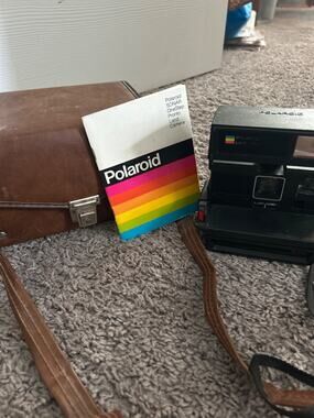 Polaroid Land camera 610 with case and Instruction booklet